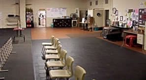Spacious activity room with lined chairs